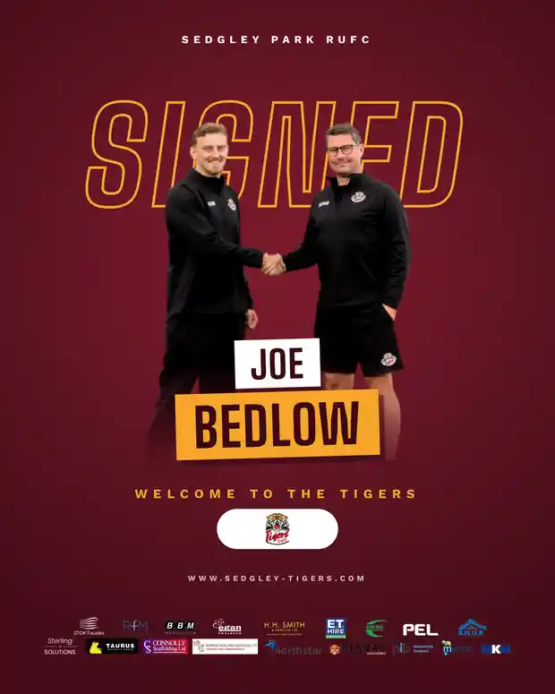 Joe Bedlow shakes hands after signing for Sedgley Park Tigers for the 2026/27 season