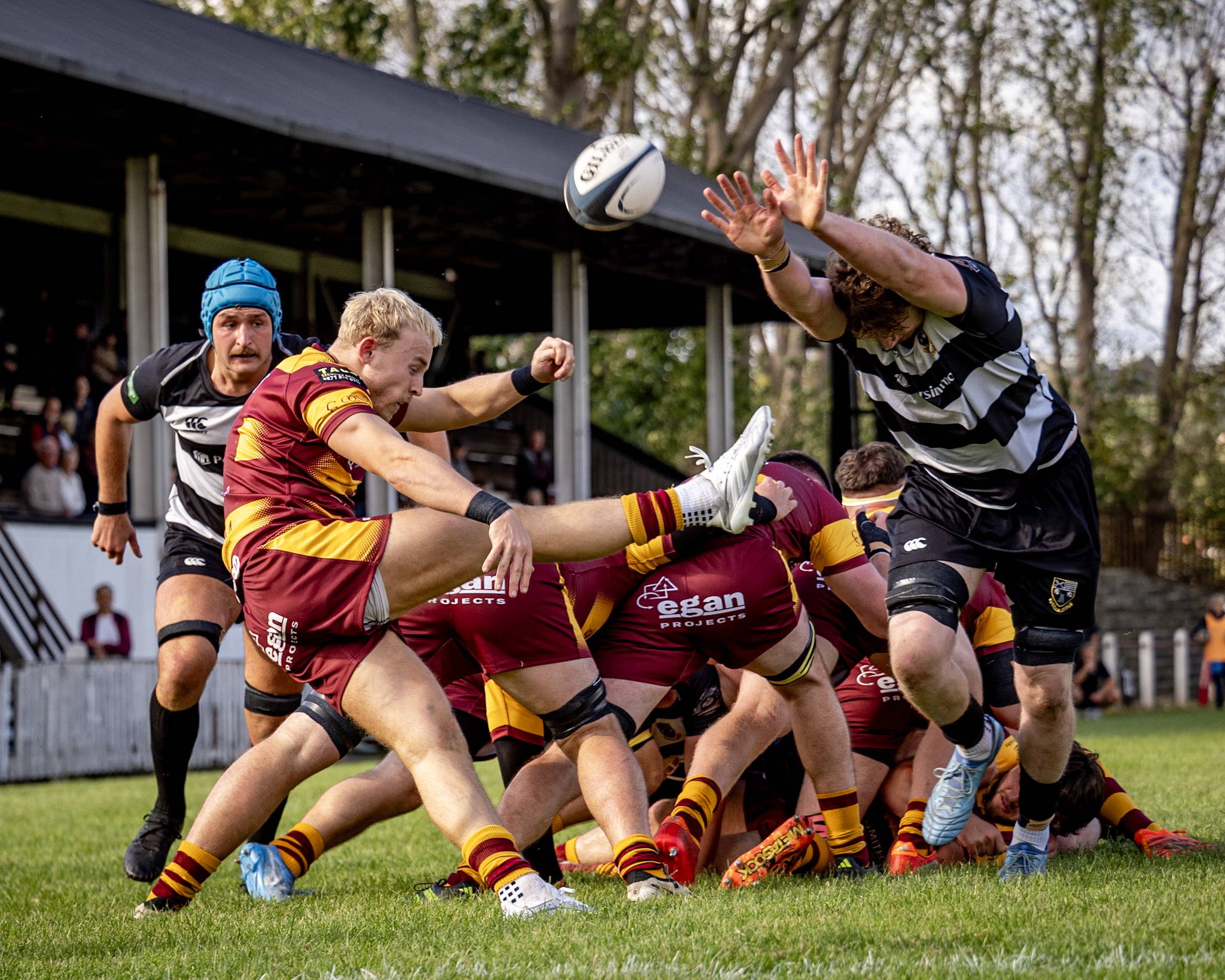 Sedgley Park clear their lines with a kick from the base of the ruck at Otley