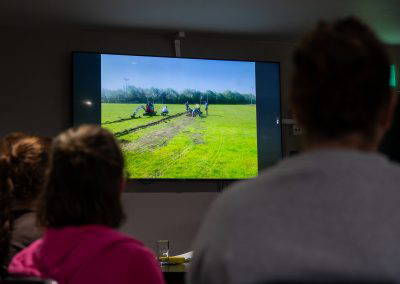 Volunteers watching a presentation about work on the pitches at Park Lane