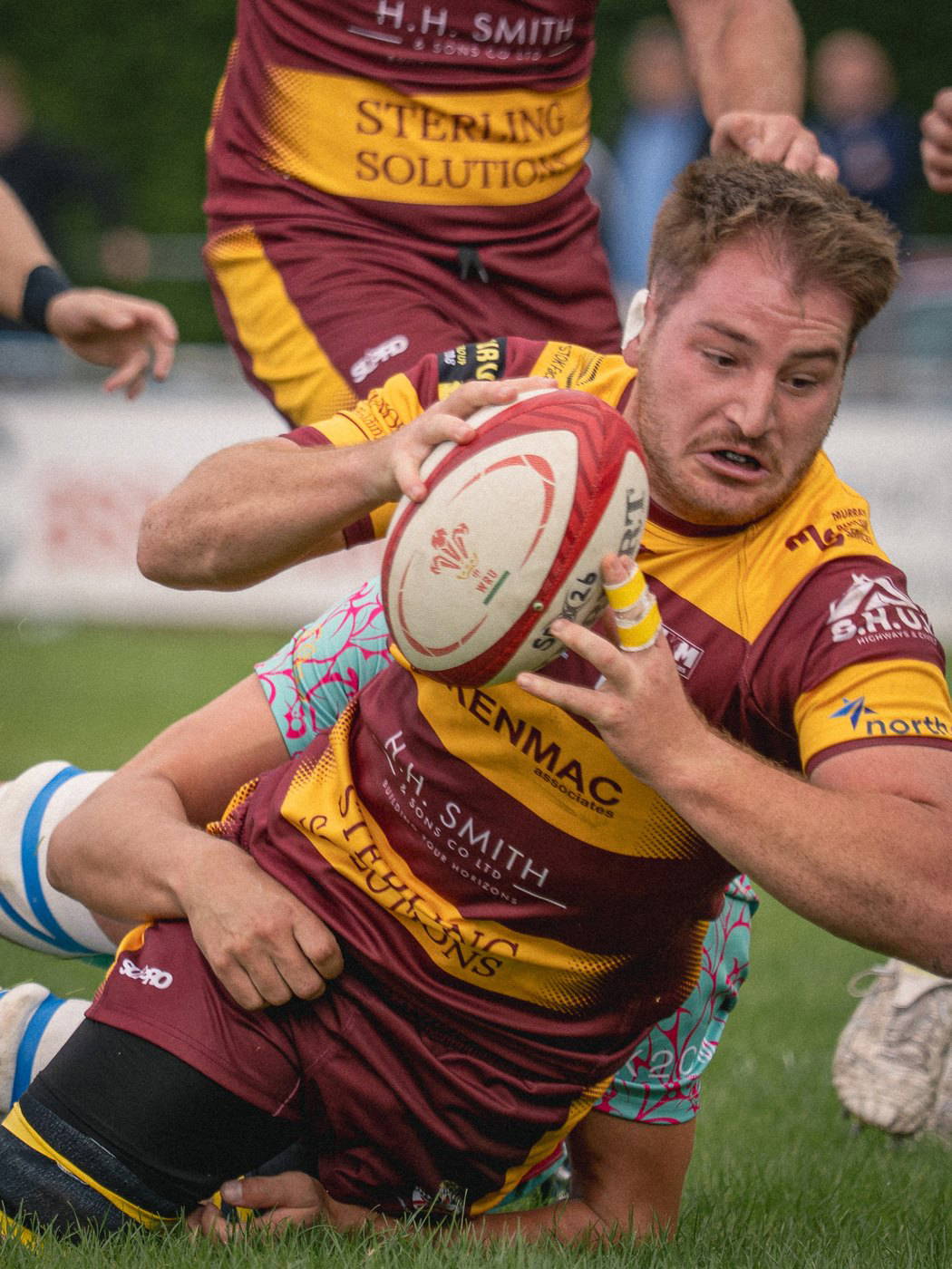 A Sedgley Park player winning the ball in a tackle at Park Lane